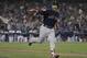 Boston Red Sox's Steve Pearce celebrates his second home run during the eighth inning in Game 5 of the World Series baseball game against the Los Angeles Dodgers on Sunday, Oct. 28, 2018, in Los Angeles. (AP Photo/David J. Phillip)