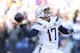 Philip Rivers will attempt to guide the Chargers past the Patriots in the divisional playoff game.