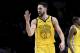 Golden State Warriors guard Klay Thompson reacts after hitting a shot late in the second half of the team's NBA basketball game against the Portland Trail Blazers in Portland, Ore., Saturday, Dec. 29, 2018. The Warriors won 115-105. (AP Photo/Steve Dykes)