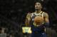 Utah Jazz's Donovan Mitchell shoots a free throw during the second half of an NBA basketball game against the Milwaukee Bucks Monday, Jan. 7, 2019, in Milwaukee. The Bucks won 114-102. (AP Photo/Aaron Gash)