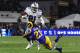 LOS ANGELES, CA - JANUARY 12: Aqib Talib #21 of the Los Angeles Rams tackles Ezekiel Elliott #21 of the Dallas Cowboys in the second quarter in the NFC Divisional Playoff game at Los Angeles Memorial Coliseum on January 12, 2019 in Los Angeles, California. (Photo by Harry How/Getty Images)