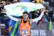NEW YORK, NY - NOVEMBER 04: Fredison Costa of Brazil crosses the finish line during the 2018 TCS New York City Marathon on November 4, 2018 in Central Park in New York City. (Photo by Elsa/Getty Images)