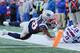 FOXBOROUGH, MA - DECEMBER 23: James White #28 of the New England Patriots rushes for a 27-yard touchdown during the second quarter against the Buffalo Bills at Gillette Stadium on December 23, 2018 in Foxborough, Massachusetts. (Photo by Jim Rogash/Getty Images)