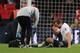 LONDON, ENGLAND - JANUARY 13: Harry Kane of Tottenham Hotspur reacts as he receives treatment for an injury at the end of the game during the Premier League match between Tottenham Hotspur and Manchester United at Wembley Stadium on January 13, 2019 in London, United Kingdom. (Photo by Marc Atkins/Getty Images)