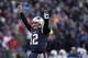 New England Patriots quarterback Tom Brady celebrates a touchdown run by running back Sony Michel during the first half of an NFL divisional playoff football game against the Los Angeles Chargers, Sunday, Jan. 13, 2019, in Foxborough, Mass. (AP Photo/Charles Krupa)