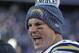 Los Angeles Chargers quarterback Philip Rivers talks to a teammate on the sideline during the first half of an NFL divisional playoff football game against the New England Patriots, Sunday, Jan. 13, 2019, in Foxborough, Mass. (AP Photo/Steven Senne)