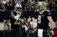 NEW ORLEANS, LOUISIANA - JANUARY 13: Michael Thomas #13 and Drew Brees #9 of the New Orleans Saints celebrate their third quarter touchdown against the Philadelphia Eagles in the NFC Divisional Playoff Game at Mercedes Benz Superdome on January 13, 2019 in New Orleans, Louisiana. (Photo by Chris Graythen/Getty Images)