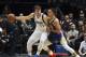 Dallas Mavericks guard Luka Doncic (77) tries to make an opening against Golden State Warriors guard Stephen Curry (30) in the first half of an NBA basketball game Sunday, Jan. 13, 2019, in Dallas. (AP Photo/Richard W. Rodriguez)