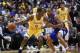 Los Angeles Lakers guard Rajon Rondo, left, handles the ball while under pressure by Los Angeles Clippers guard Avery Bradley during the second half of an NBA preseason basketball game in Anaheim, Calif., Saturday, Oct. 6, 2018. The Clippers won 103-87. (AP Photo/Kelvin Kuo)