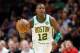 MIAMI, FL - JANUARY 10: Terry Rozier #12 of the Boston Celtics dribbles with the ball against the Miami Heat at American Airlines Arena on January 10, 2019 in Miami, Florida. NOTE TO USER: User expressly acknowledges and agrees that, by downloading and or using this photograph, User is consenting to the terms and conditions of the Getty Images License Agreement. (Photo by Michael Reaves/Getty Images)