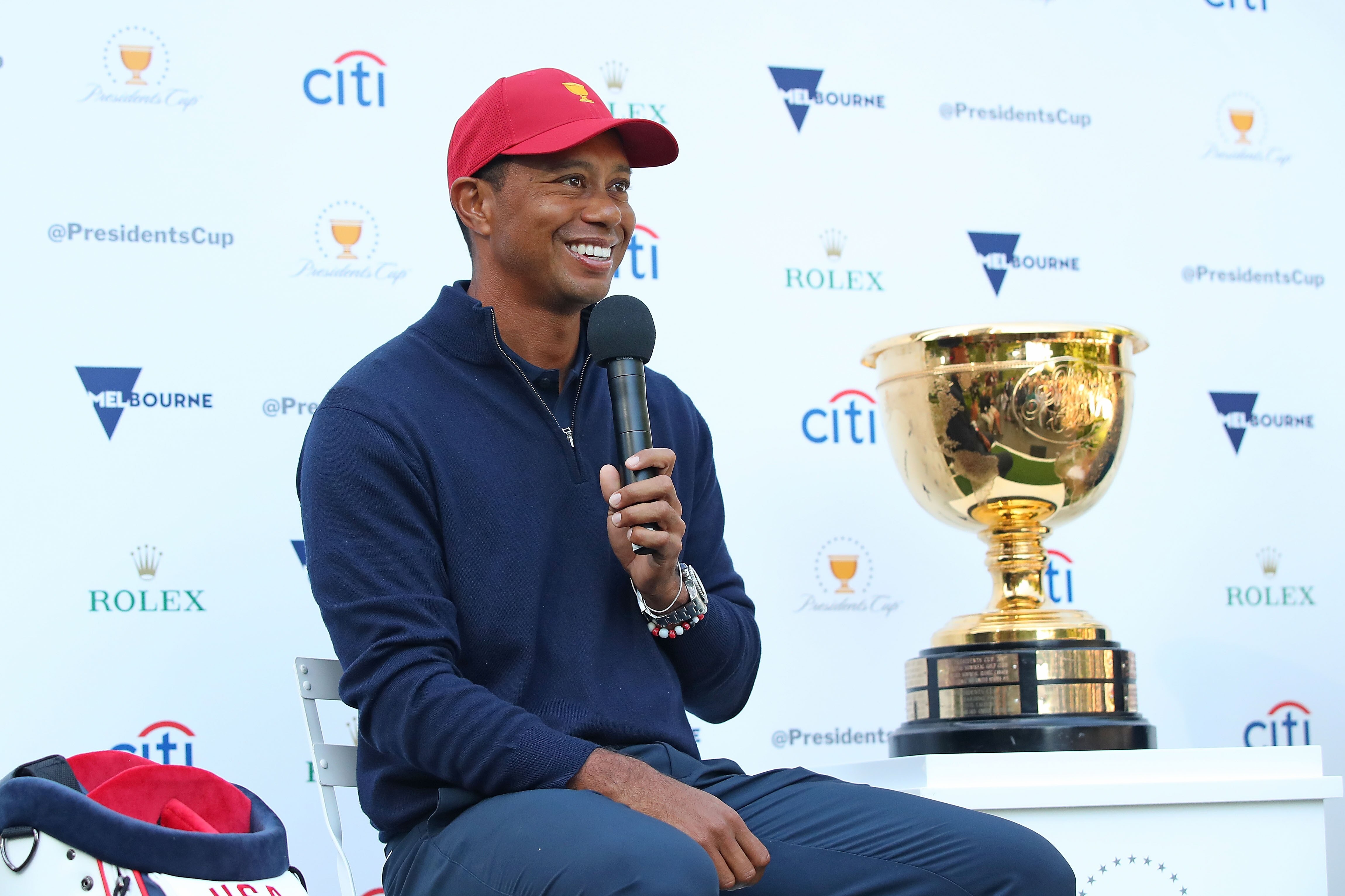 MELBOURNE, AUSTRALIA - DECEMBER 06:  Tiger Woods speaks next to the Presidents Cup during a Presidents Cup media opportunity at the Yarra Promenade on December 5, 2018 in Melbourne, Australia. The Presidents Cup 2019 will be held on December 9-15, 2019, when it returns to the prestigious Royal Melbourne Golf Club in Australia.  (Photo by Scott Barbour/Getty Images)