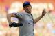 Kansas City Royals starting pitcher Eric Skoglund throws to a Texas Rangers batter during the first inning of a baseball game Friday, May 25, 2018, in Arlington, Texas. (AP Photo/Richard W. Rodriguez)