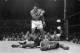 FILE - In this May 25, 1965, file photo, Muhammad Ali stands over Sonny Liston after knocking Liston down during their' heavyweight championship bout in Lewiston, Maine. (AP Photo/John Rooney, File)