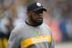 OAKLAND, CA - DECEMBER 09: Head coach Mike Tomlin of the Pittsburgh Steelers looks on while his team warms up prior to the start of an NFL football game against the Oakland Raiders at Oakland-Alameda County Coliseum on December 9, 2018 in Oakland, California. (Photo by Thearon W. Henderson/Getty Images)