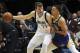 Dallas Mavericks guard Luka Doncic (77) tries to make an opening against Golden State Warriors guard Stephen Curry (30) in the first half of an NBA basketball game Wednesday, Jan. 13, 2019, in Dallas. (AP Photo/Richard W. Rodriguez)