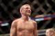 TJ Dillashaw is seen after his fight against Dominick Cruz in their mixed martial arts title bout at UFC Fight Night 81, Sunday, Jan. 17, 2016, in Boston. Cruz won via split decision and is the new UFC Bantamweight Champion. (AP Photo/Gregory Payan)