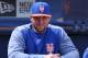PORT ST. LUCIE, FL - MARCH 7: Tim Tebow #83 of the New York Mets look on from the dugout prior to the spring training game against the New York Yankees at First Date Field on March 7, 2018 in Port St. Lucie, Florida. The Yankees defeated the Mets 11-4. (Photo by Joel Auerbach/Getty Images)