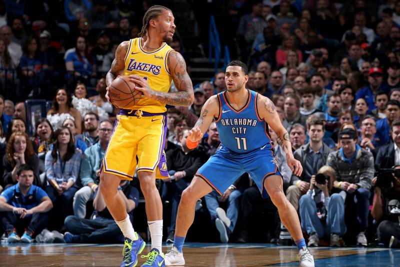 OKLAHOMA CITY, OK- JANUARY 17: Los Angeles Lakers forward Michael Beasley #11 handles the ball while Oklahoma City Thunder forward Abdel Nader #11 plays defense during the game on January 17, 2019 at Chesapeake Energy Arena in Oklahoma City, Oklahoma. NOTE TO USER: User expressly acknowledges and agrees that, by downloading and or using this photograph, User is consenting to the terms and conditions of the Getty Images License Agreement. Mandatory Copyright Notice: Copyright 2019 NBAE (Photo by Zach Beeker/NBAE via Getty Images)