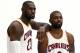 Cleveland Cavaliers forward LeBron James (23) and guard Kyrie Irving pose for photos during the NBA basketball team's media day, Monday, Sept. 26, 2016, in Independence, Ohio. (AP Photo/Ron Schwane)