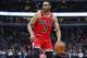 Chicago Bulls forward Jabari Parker drives to the basket against the Boston Celtics during the first half of an NBA basketball game, Saturday, Dec. 8, 2018, in Chicago. (AP Photo/Kamil Krzaczynski)