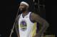 FILE - In this Sept. 24, 2018 file photo, Golden State Warriors' DeMarcus Cousins poses for photos during media day at the NBA basketball team's practice facility in Oakland, Calif. Cousins will start immediately for coach Steve Kerr when the All-Star center makes his long-awaited Warriors debut in about a week following his lengthy recovery from surgery on a torn left Achilles tendon. Cousins has targeted a game Jan. 18, 2019, at the Clippers as his return date and first game of the season, though Kerr said it could even be sooner if all continues going well.(AP Photo/Jeff Chiu, File)