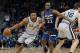 San Antonio Spurs' Rudy Gay, left, drives as Minnesota Timberwolves' Andrew Wiggins, center tries to get around Pau Gasol of Spain in the first half of an NBA basketball game Friday, Jan. 18, 2019, in Minneapolis. (AP Photo/Jim Mone)