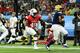 ST PETERSBURG, FLORIDA - JANUARY 19: Nick Brossette #5 from Louisiana State playing on the West Team catches a touchdown pass during the first quarter against the East Team at the 2019 East-West Shrine Game at Tropicana Field on January 19, 2019 in St Petersburg, Florida. (Photo by Julio Aguilar/Getty Images)