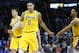 Los Angeles Lakers forward Kyle Kuzma (0) is congratulated by teammate Josh Hart during an NBA basketball game between the Los Angeles Lakers and the Oklahoma City Thunder in Oklahoma City, Thursday, Jan. 17, 2019. (AP Photo/Sue Ogrocki)