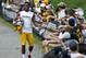 Pittsburgh Steelers wide receiver Antonio Brown is greeted by fans as he takes to the practice field during NFL football training camp in Latrobe, Pa., Thursday, July 26, 2018. (AP Photo/Keith Srakocic)