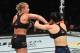 NEW YORK, NY - JANUARY 19: (L-R) Paige VanZant punches Rachael Ostovich in their women's flyweight bout during the UFC Fight Night event at the Barclays Center on January 19, 2019 in the Brooklyn borough of New York City. (Photo by Josh Hedges/Zuffa LLC/Zuffa LLC via Getty Images)