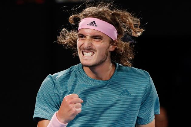 Greece's Stefanos Tsitsipas reacts after a point against Switzerland's Roger Federer during their men's singles match on day seven of the Australian Open tennis tournament in Melbourne on January 20, 2019. (Photo by DAVID GRAY / AFP) / -- IMAGE RESTRICTED TO EDITORIAL USE - STRICTLY NO COMMERCIAL USE --        (Photo credit should read DAVID GRAY/AFP/Getty Images)