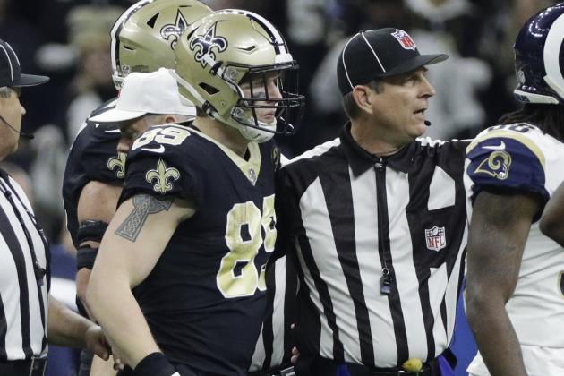 New Orleans Saints' Josh Hill is helped off the field after being hit during the first half of the NFL football NFC championship game against the Los Angeles Rams, Sunday, Jan. 20, 2019, in New Orleans. (AP Photo/David J. Phillip)
