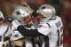 New England Patriots quarterback Tom Brady celebrates with center David Andrews (60) after throwing a touchdown pass to wide receiver Phillip Dorsett during the first half of the AFC Championship NFL football game against the Kansas City Chiefs, Sunday, Jan. 20, 2019, in Kansas City, Mo. (AP Photo/Jeff Roberson)