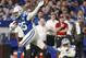 INDIANAPOLIS, IN - DECEMBER 16: Eric Ebron #85 of the Indianapolis Colts runs the ball as Chidobe Awuzie #24 of the Dallas Cowboys tries to make the shoestring tackle during the game at Lucas Oil Stadium on December 16, 2018 in Indianapolis, Indiana. (Photo by Michael Hickey/Getty Images)