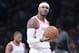 File- This Nov. 2, 2018, file photo shows Houston Rockets forward Carmelo Anthony reacting during the second half of an NBA basketball game in New York. A person with knowledge of the situation says the Houston Rockets are trading Carmelo Anthony and an undisclosed amount of cash to the Chicago Bulls, in a deal that is expected to be completed Tuesday, Jan. 22, 2019. Anthony will not wind up playing for the Bulls, said the person who spoke to The Associated Press on condition of anonymity because nothing can be finalized until the league office approves the deal. (AP Photo/Mary Altaffer, File)