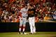 BALTIMORE, MD - JULY 10: Bryce Harper #34 of the Washington Nationals and Manny Machado #13 of the Baltimore Orioles talk during their game at Oriole Park at Camden Yards on July 10, 2015 in Baltimore, Maryland. (Photo by Rob Carr/Getty Images)