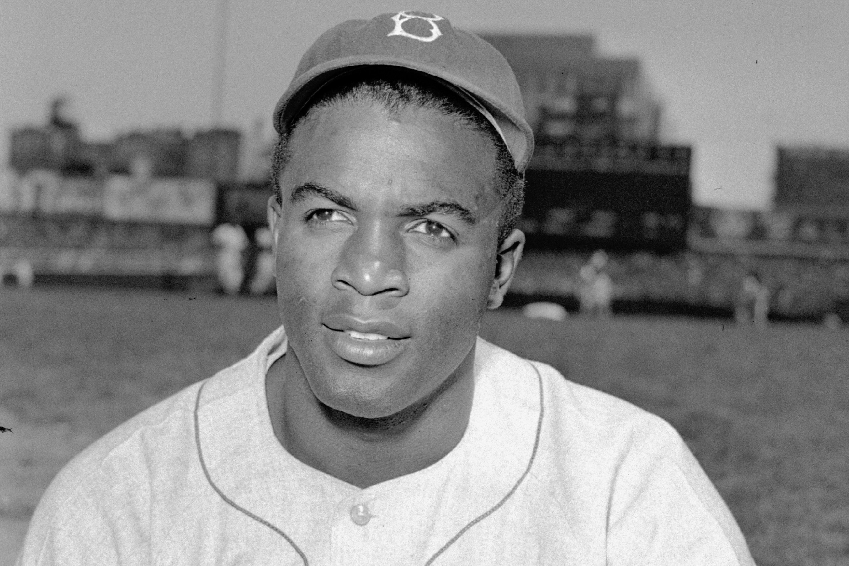 BASEBALL) Jackie Robinson signing a contract with Brooklyn