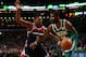 BOSTON, MA - DECEMBER 25: Kyrie Irving #11 of the Boston Celtics drives to the basket Bradley Beal #3 of the Washington Wizards during the game at TD Garden on December 25, 2017 in Boston, Massachusetts. NOTE TO USER: User expressly acknowledges and agrees that, by downloading and or using this photograph, User is consenting to the terms and conditions of the Getty Images License Agreement. (Photo by Omar Rawlings/Getty Images)