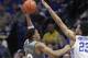 Mississippi State's Robert Woodard, left, shoots while defended by Kentucky's EJ Montgomery (23) during the first half of an NCAA college basketball game in Lexington, Ky., Tuesday, Jan. 22, 2019. (AP Photo/James Crisp)