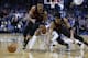 Oklahoma City Thunder guard Russell Westbrook, center, Portland Trail Blazers guard C.J. McCollum, left, and guard Evan Turner, right, chase a loose ball in the first half of an NBA basketball game in Oklahoma City, Tuesday, Jan. 22, 2019. (AP Photo/Sue Ogrocki)