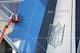 Workers hang banners on Mercedes-Benz Stadium in preparation for the NFL Super Bowl football game, Thursday, Jan. 10, 2019, in Atlanta. (AP Photo/John Bazemore)