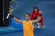 MELBOURNE, AUSTRALIA - JANUARY 22: Rafael Nadal of Spain celebrates beating Frances Tiafoe of the United States during day nine of the 2019 Australian Open at Melbourne Park on January 22, 2019 in Melbourne, Australia. (Photo by TPN/Getty Images)