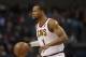 Cleveland Cavaliers' Rodney Hood (1) brings the ball up court against the Charlotte Hornets during the first half of an NBA basketball game in Charlotte, N.C., Wednesday, Dec. 19, 2018. (AP Photo/Chuck Burton)