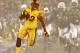 TAMPA, FL - 01 de fevereiro: James Harrison # 92 do Pittsburgh Steelers marca um touchdown depois de correr de volta uma interceptação por 100 jardas no segundo trimestre contra o Arizona Cardinals durante Super Bowl XLIII em 1 de fevereiro de 2009 no Raymond James Stadium, em Tampa, Flórida (Foto de Al Bello / Getty Images)
