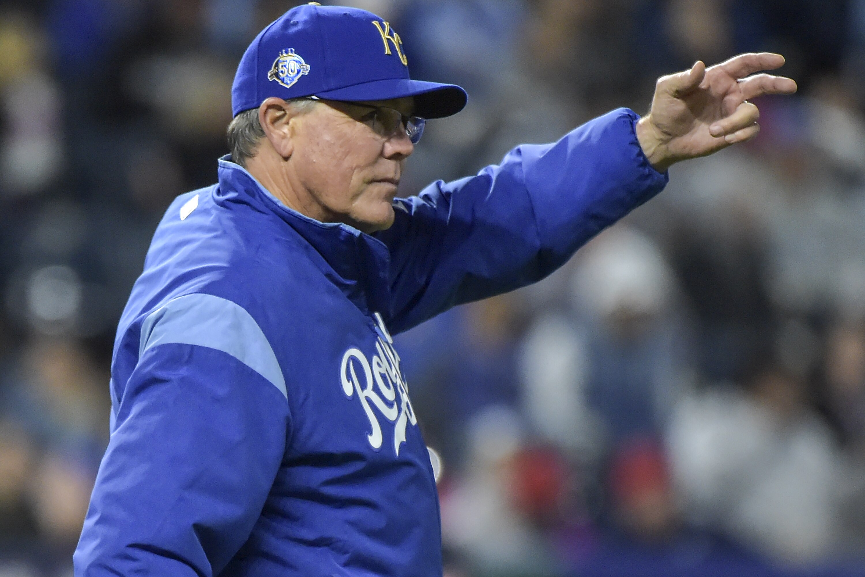 KANSAS CITY, MO - SEPTEMBER 28: Manager Ned Yost #3 of the Kansas City Royals signals for a pitching change in the seventh inning against the Cleveland Indians at Kauffman Stadium on September 28, 2018 in Kansas City, Missouri. (Photo by Ed Zurga/Getty Images)