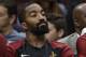 Cleveland Cavaliers' JR Smith watches from the bench during the first half of the team's NBA basketball game against the Denver Nuggets, Thursday, Nov. 1, 2018, in Cleveland. The Nuggets won 110-91. (AP Photo/Tony Dejak)
