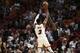 Miami Heat guard Dwyane Wade (3) shoots the ball during the first half of an NBA basketball game Wednesday, Jan. 23, 2019, in Miami. (AP Photo/Brynn Anderson)