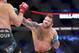 Ryan Bader, right, hits Matt Mitrione during a heavyweight mixed martial arts bout at Bellator 207, in Uncasville, CT, on Friday, October 12, 2018. Bader won via unanimous decision. (AP Photo/Gregory Payan)