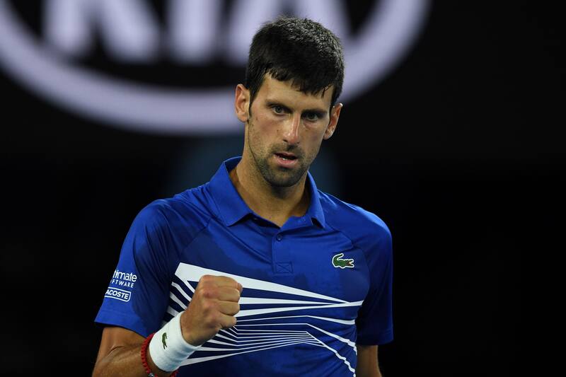 Serbia's Novak Djokovic reacts after a point against Spain's Rafael Nadal during the men's singles final on day 14 of the Australian Open tennis tournament in Melbourne on January 27, 2019. (Photo by Greg Wood / AFP) / -- IMAGE RESTRICTED TO EDITORIAL USE - STRICTLY NO COMMERCIAL USE -- (Photo credit should read GREG WOOD/AFP/Getty Images)
