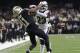 FILE - In this Jan. 20, 2019, file photo, Los Angeles Rams' Nickell Robey-Coleman breaks up a pass intended for New Orleans Saints' Tommylee Lewis during the second half of the NFL football NFC championship game, in New Orleans. Jacksonville Jaguars defensive end Calais Campbell watched the NFL’s conference championship games on his phone while flying home from South Africa last weekend. Campbell was stunned officials chose not to penalize Robey-Coleman for flattening Saints receiver Tommylee Lewis before the ball arrived. (AP Photo/Gerald Herbert, File)